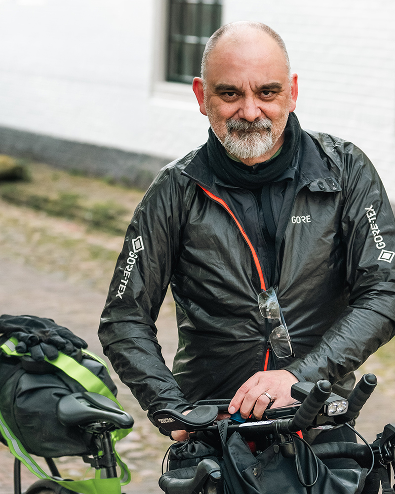 Nik van Herpt, cartographer and filmmaker, photographed during Race Around the Netherlands 2024.